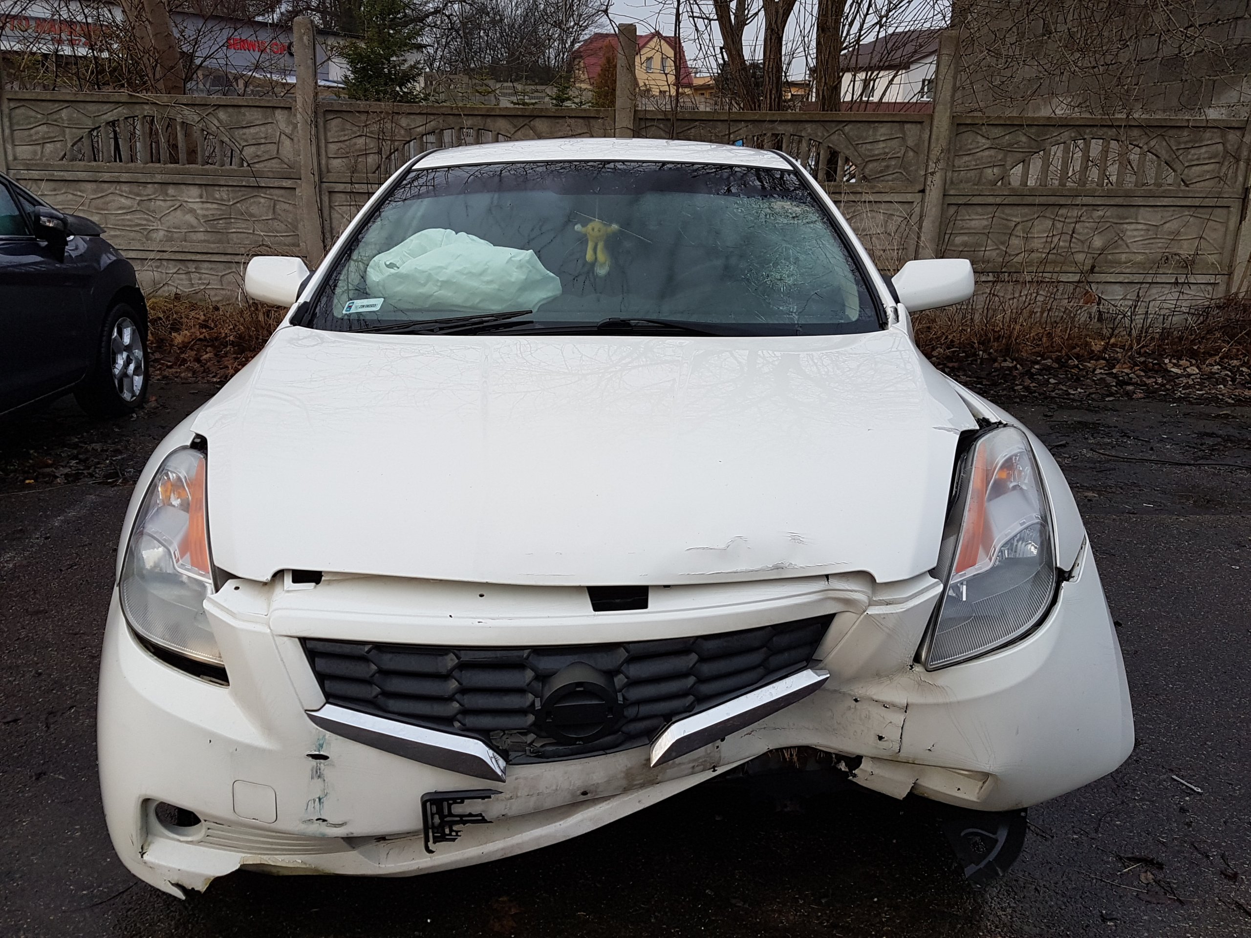 Nissan Altima Coupe uszkodzony 7109296818 oficjalne