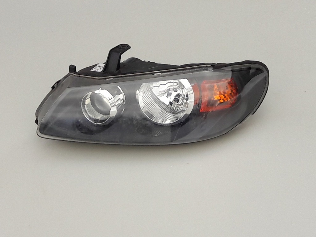 Reflektor lewy lampa przód Nissan Almera N16 Lift