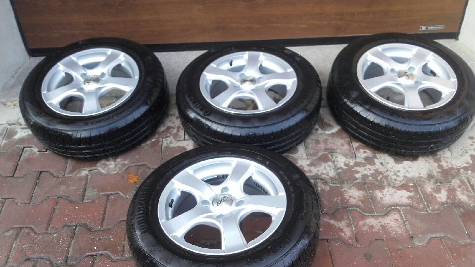 koła alufelgi 15' NISSAN TIIDA jak nowe 23 tys. km