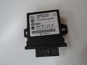 Модуль блок керування світла vw eos golf touran tiguan фото №1