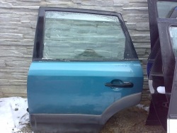 Hyundai TUCSON 2004 - 2009 дверь левая задняя . HE