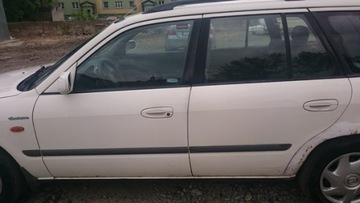 Door glass right-wing hind mazda 626 v 97 - 01, фото