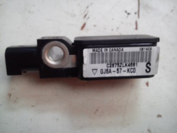 Shock sensor lateral mazda original gj6a57kc0, фото