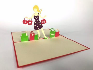 Woman on shopping card 3-door for a gift shopping acknowledgments women's day, фото