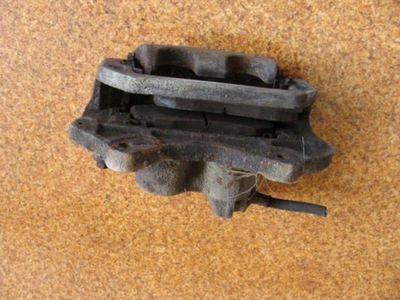 Mitsubishi l200 04r супорт перед правий фото №1