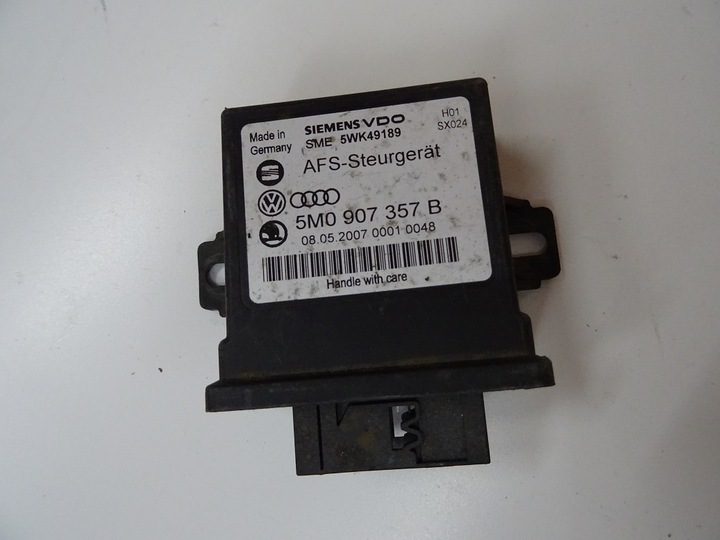 фото №1, Модуль блок керування світла vw eos golf touran tiguan