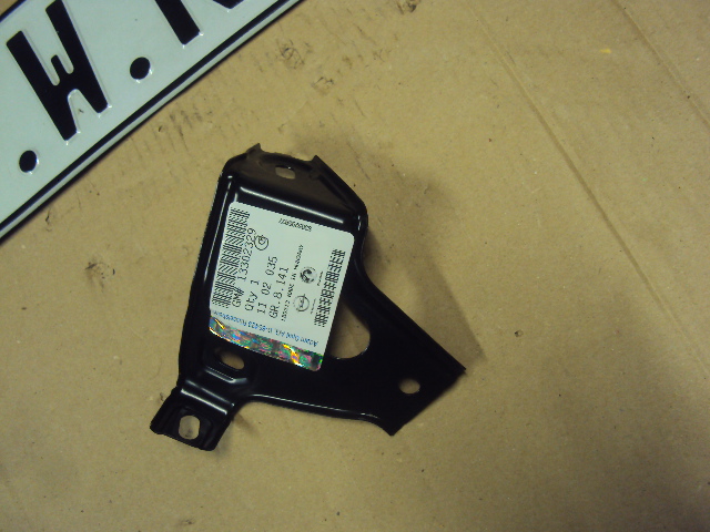 фото №1, Кронштейн крила lewego opel astra iv